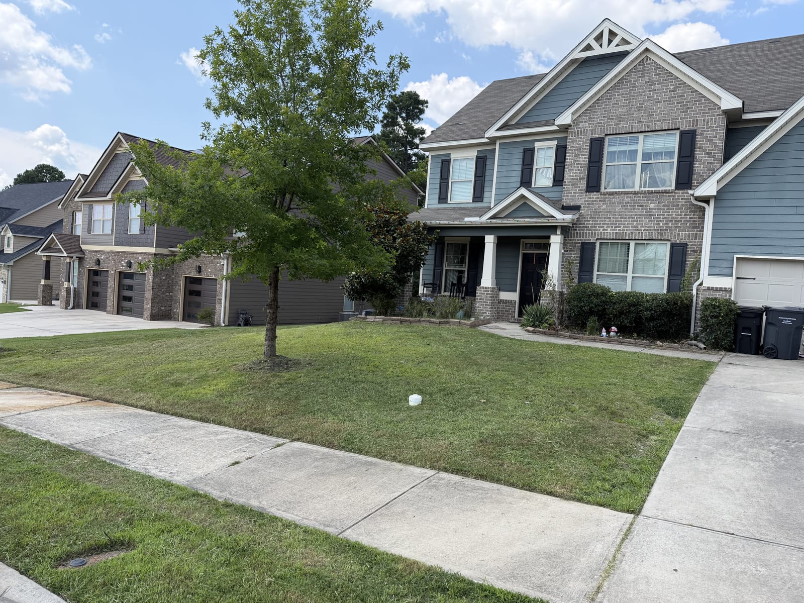 Manicured front lawn after a fresh mow