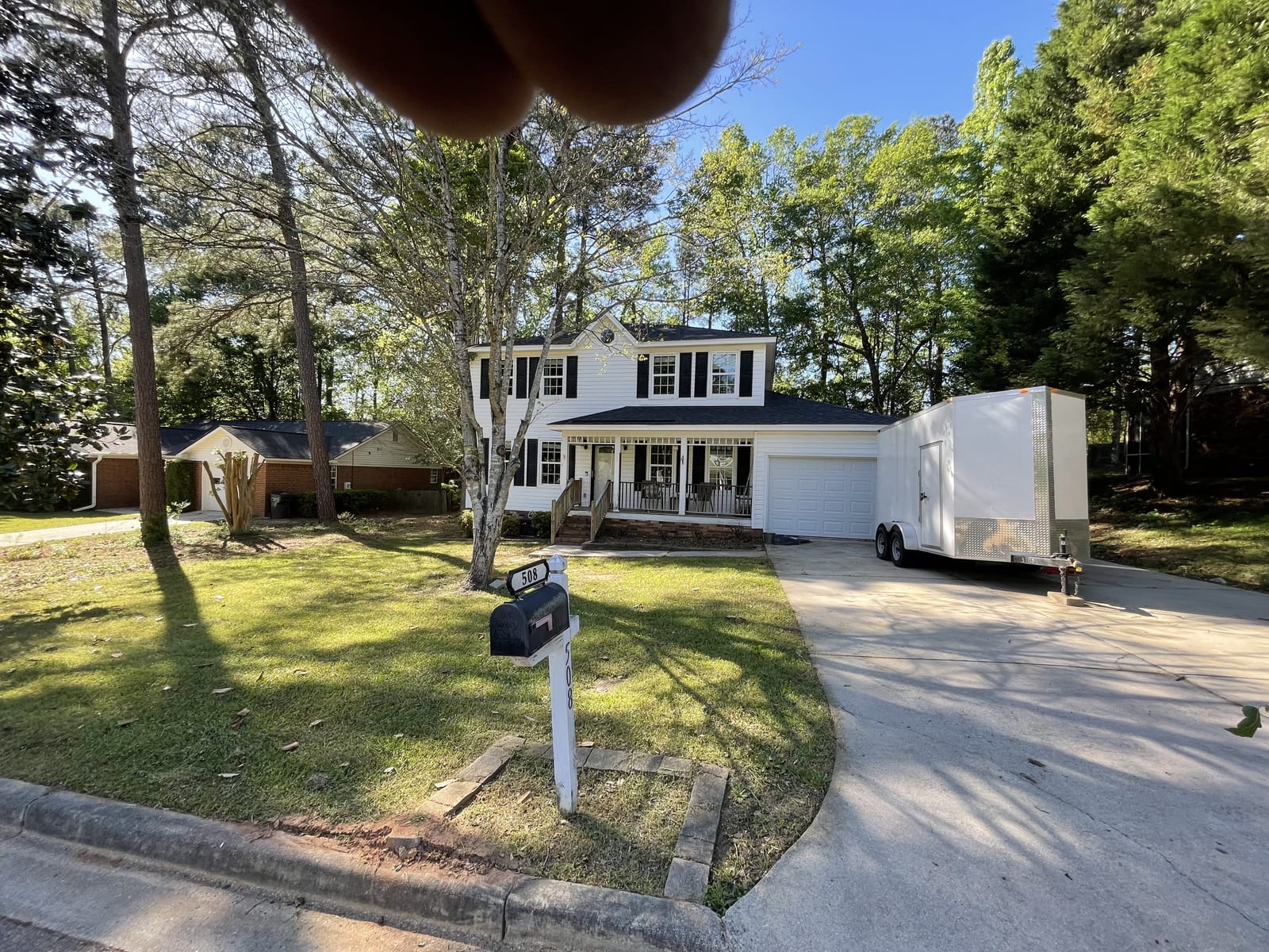 Tidy, freshly cut front yard at a two-story home